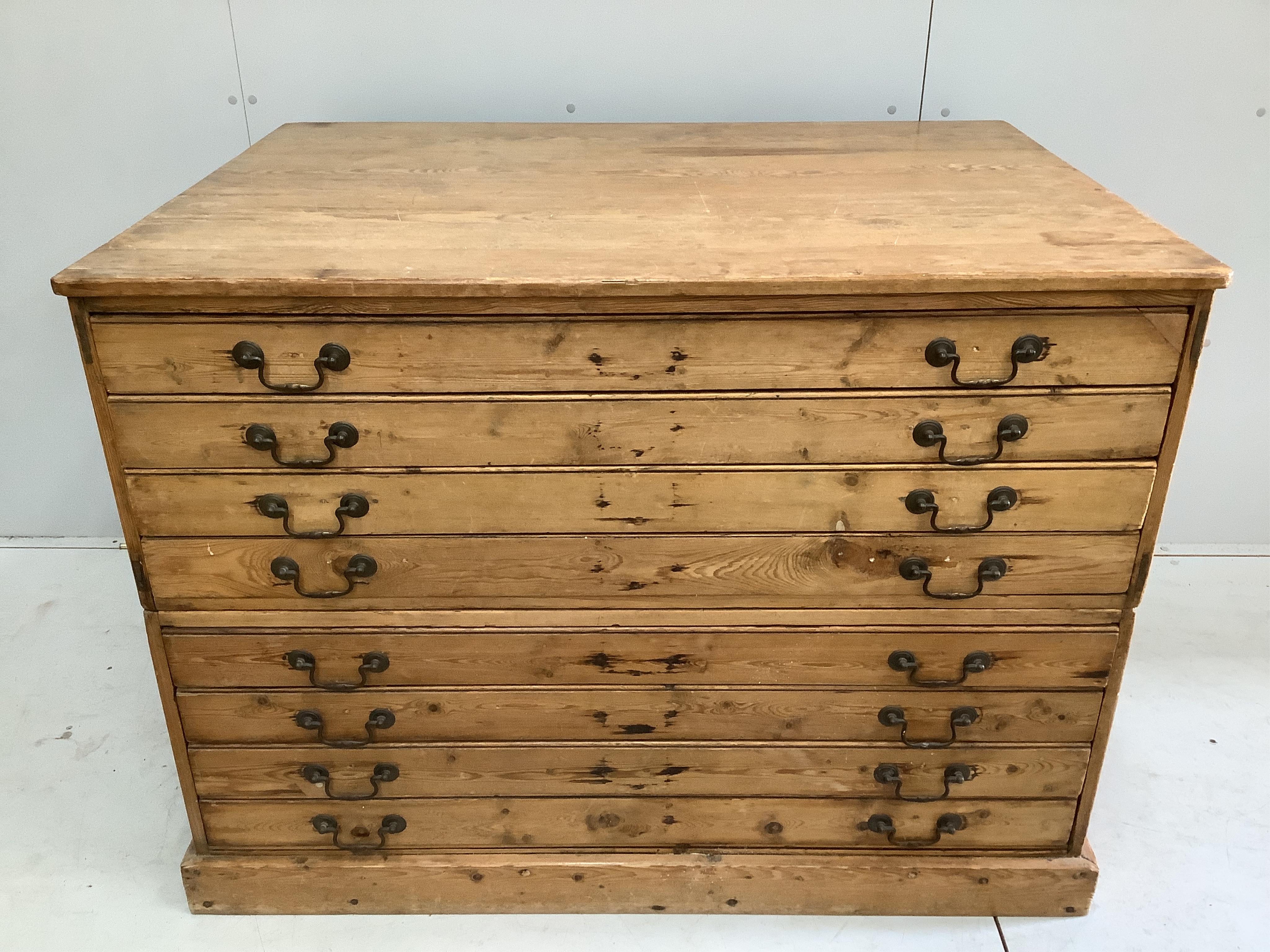 A Victorian pine eight drawer two part plan chest, width 121cm, depth 88cm, height 90cm